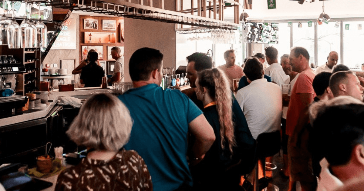 Guest ordering at Spike's bar