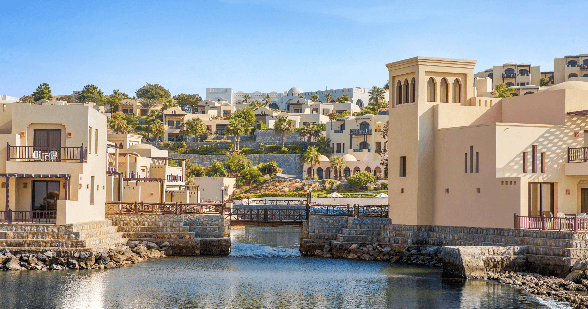 Scenic view of Cove Rotana Resort’s luxurious villas and serene waterfront in Ras Al Khaimah.