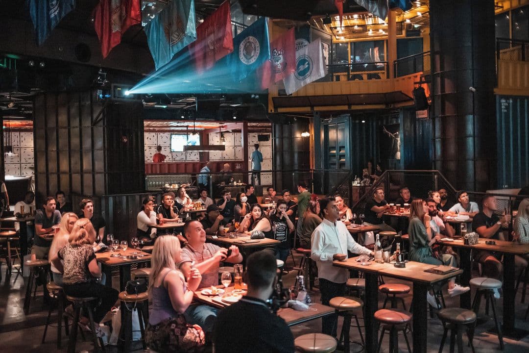 Guests enjoying drinks and food