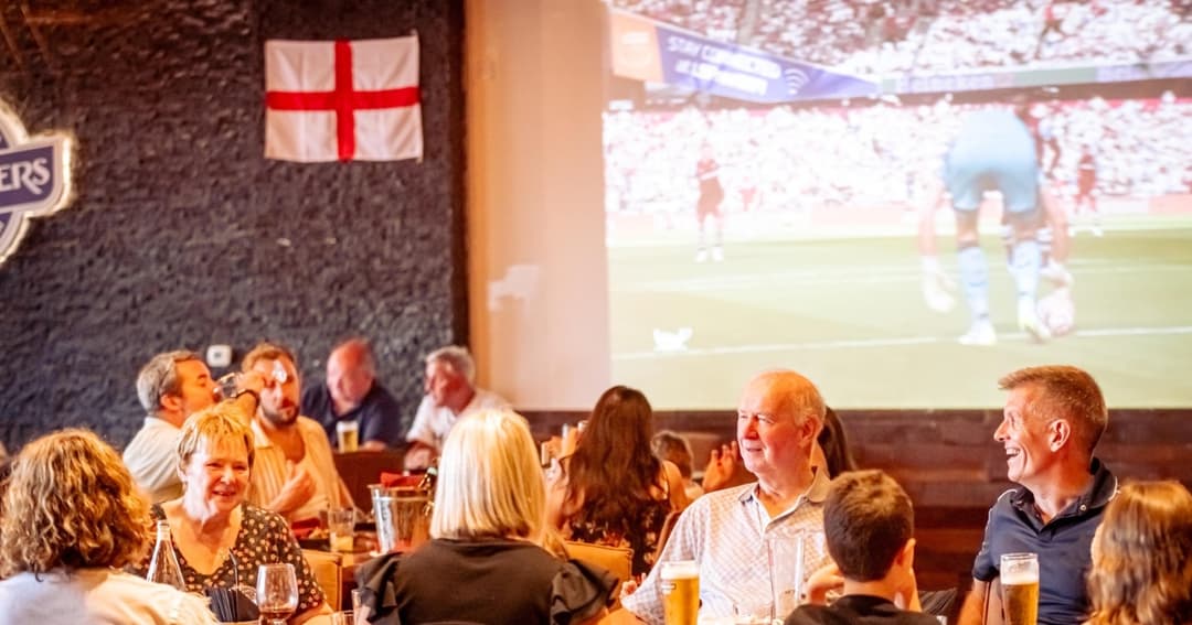 TV screen showing football game
